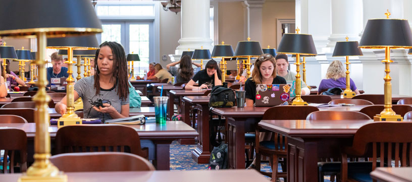 Students studying in reading room