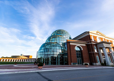 Wide angle image with the Torggler Fine Arts Center in the foreground on the right and the Ferguson Center for the Arts in the background on the left