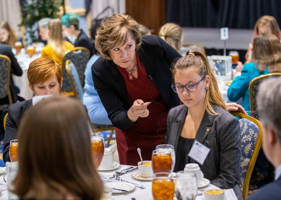 Lynne Breil, president of The Professional Edge, instructs senior electrical engineering major Tatiana Pickard.