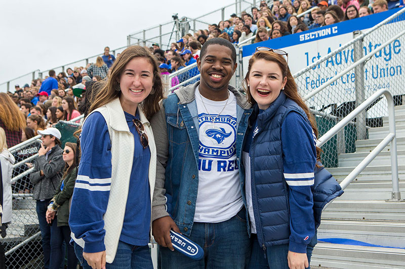 Students at CNU Homecoming football game