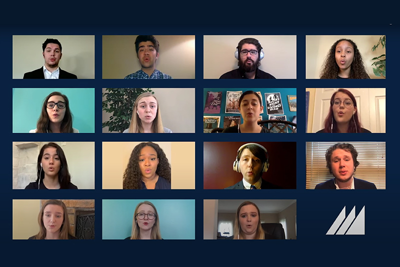 Students sing the Alma Mater during a live video event.