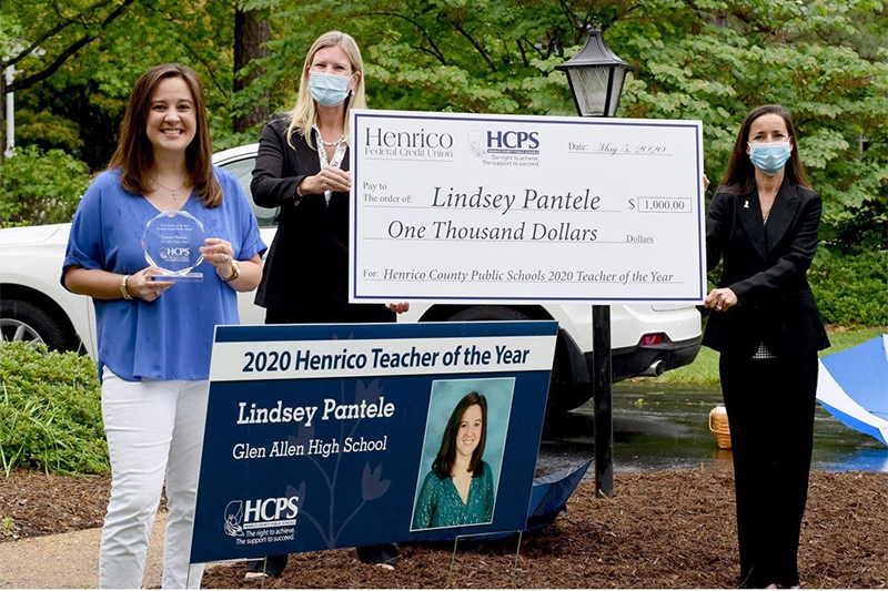 Lindsey Pantele, left, with HCPS officials