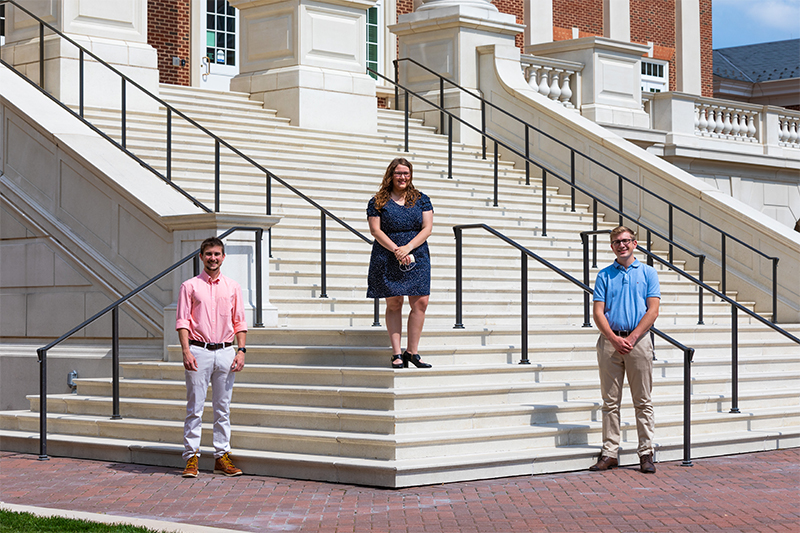 Jonathan Sicher, Holly Foster and David Harrop on the steps of Christopher Newport Hall