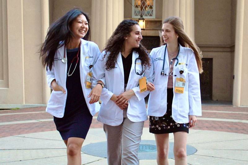 photo of three Christopher Newport alumna who now attend Virginia Commonwealth University medical school; from left to right: Vanessa Lin, Miriam Hammad, Amy Doody