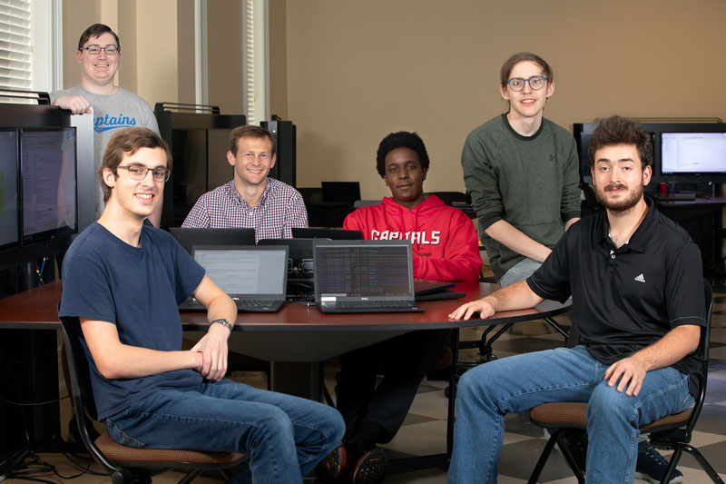 Left to right: Aiden Tersine, William Reames, Jack Lynam, Matthew Wakhweya, Charles Steelberg, Blaine Morse