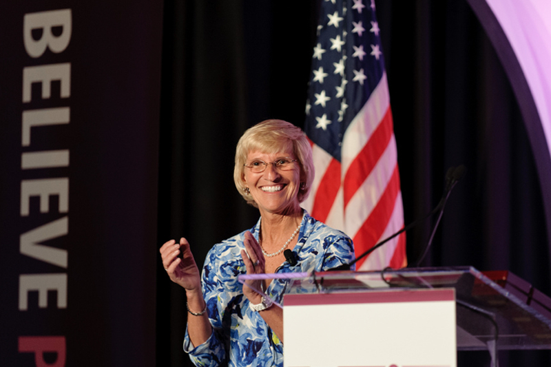 Jill Chambers speaking at a lectern