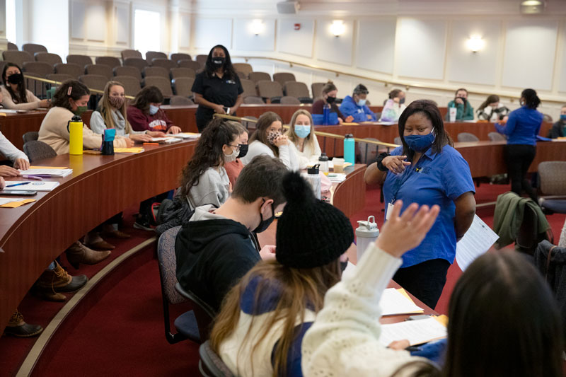 Newport News Public Schools staff present offers teaching jobs to students in the teacher preparation program