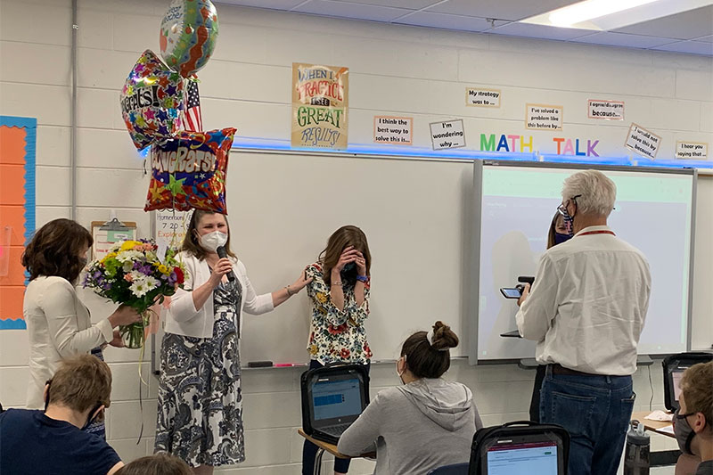 School staff surprise Megan Harris with the Gloucester County Teacher of the Year Award