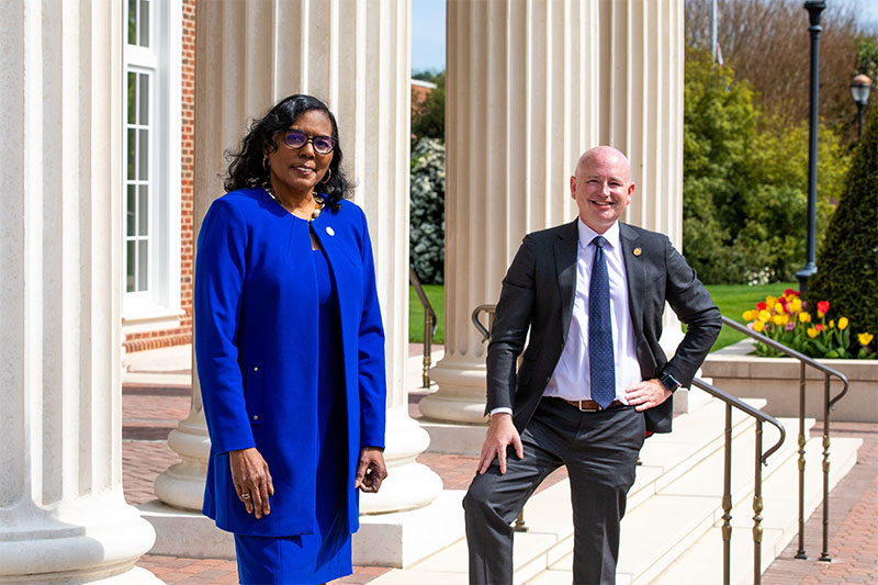 Jeion Ward (left) and Mike Mullin in front of Pope Chapel on campus at CNU