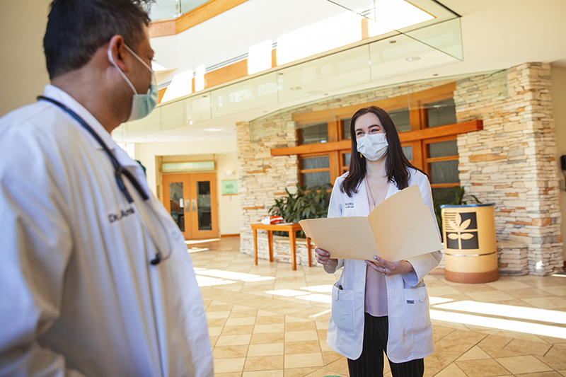 Miriam Stump (right) with Dr. Biral Amin, radiation oncologist at Riverside Hospital