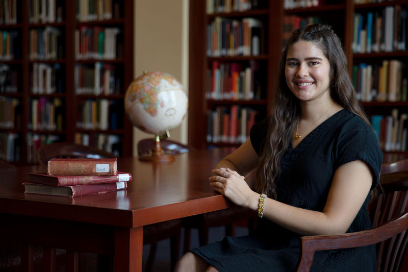 Sydney King in a Trible Library reading room