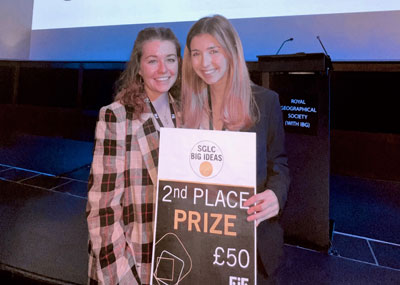 Photo of Claire Rooney (left) and Brooke Nixon holding their second prize award