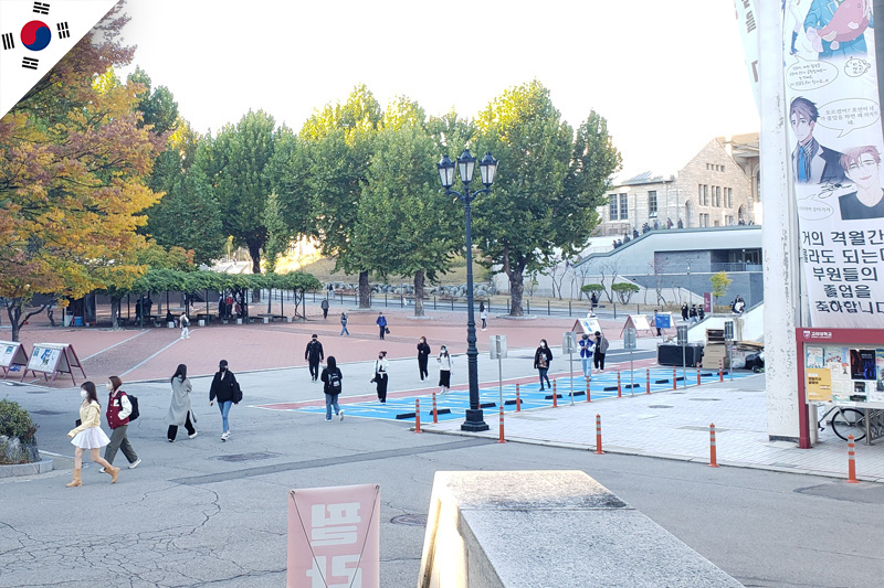 The main square at Korea University. Students walk around it during the day.