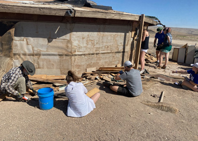 Students work to build a hogan in Arizona. 