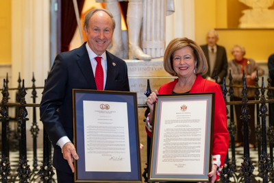 Photo of Paul and Rosemary Trible with the joint resolutions