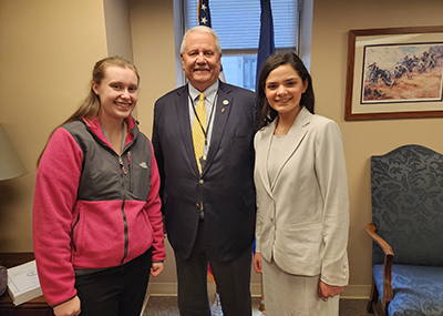 Crystal Beazley (left) and Isabella DaCunha (right) stand with Del. Hyland Franklin “Buddy” Fowler.