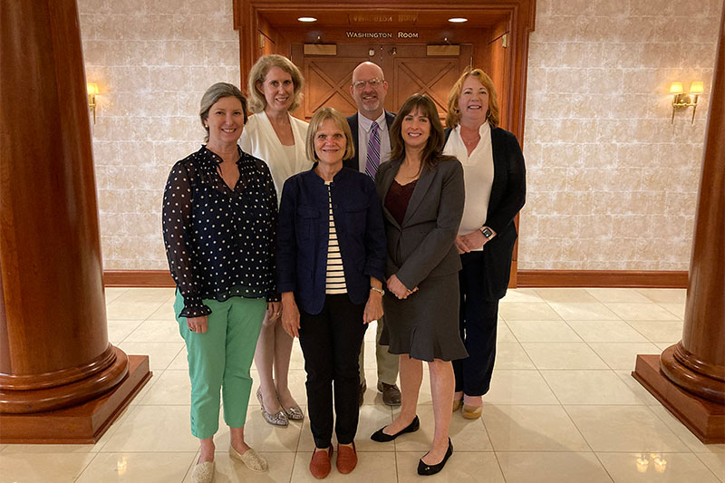 CNU faculty stand with Colonial Williamsburg Foundation staff.