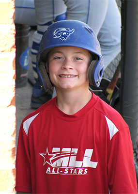 Young Aaron Moxie as a batboy