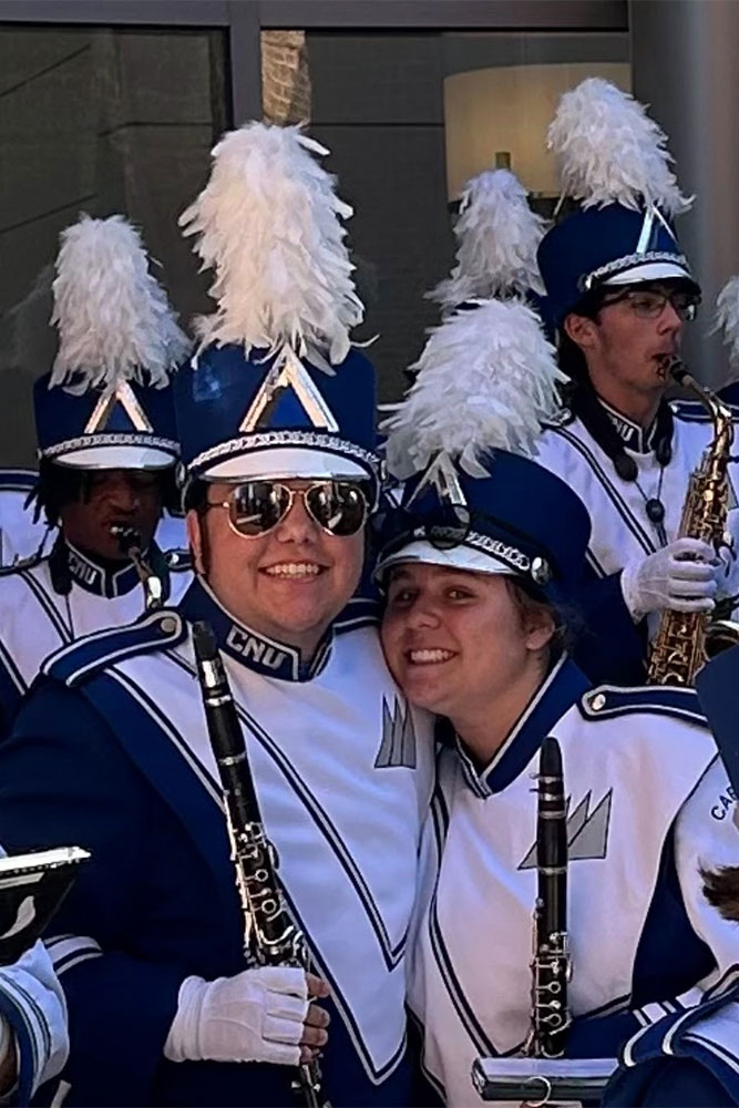 Jay and Molly wearing their Marching Captains uniforms