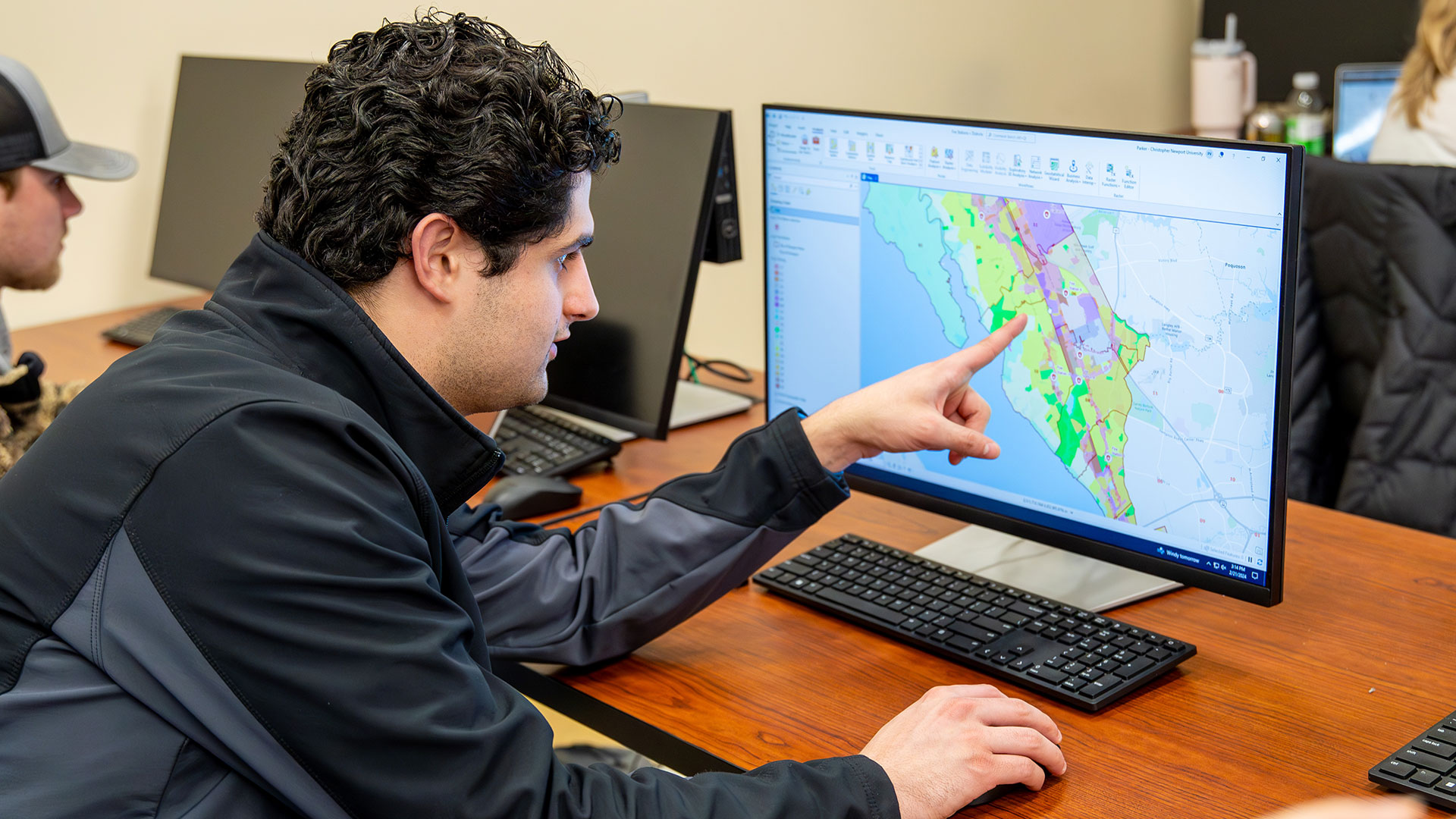 Student using mapping software on a computer