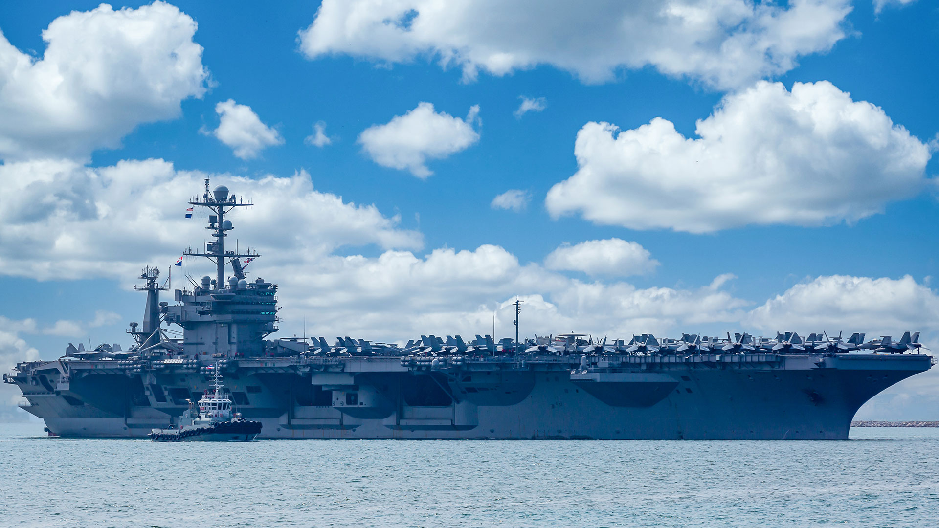An aircraft carrier at sea.