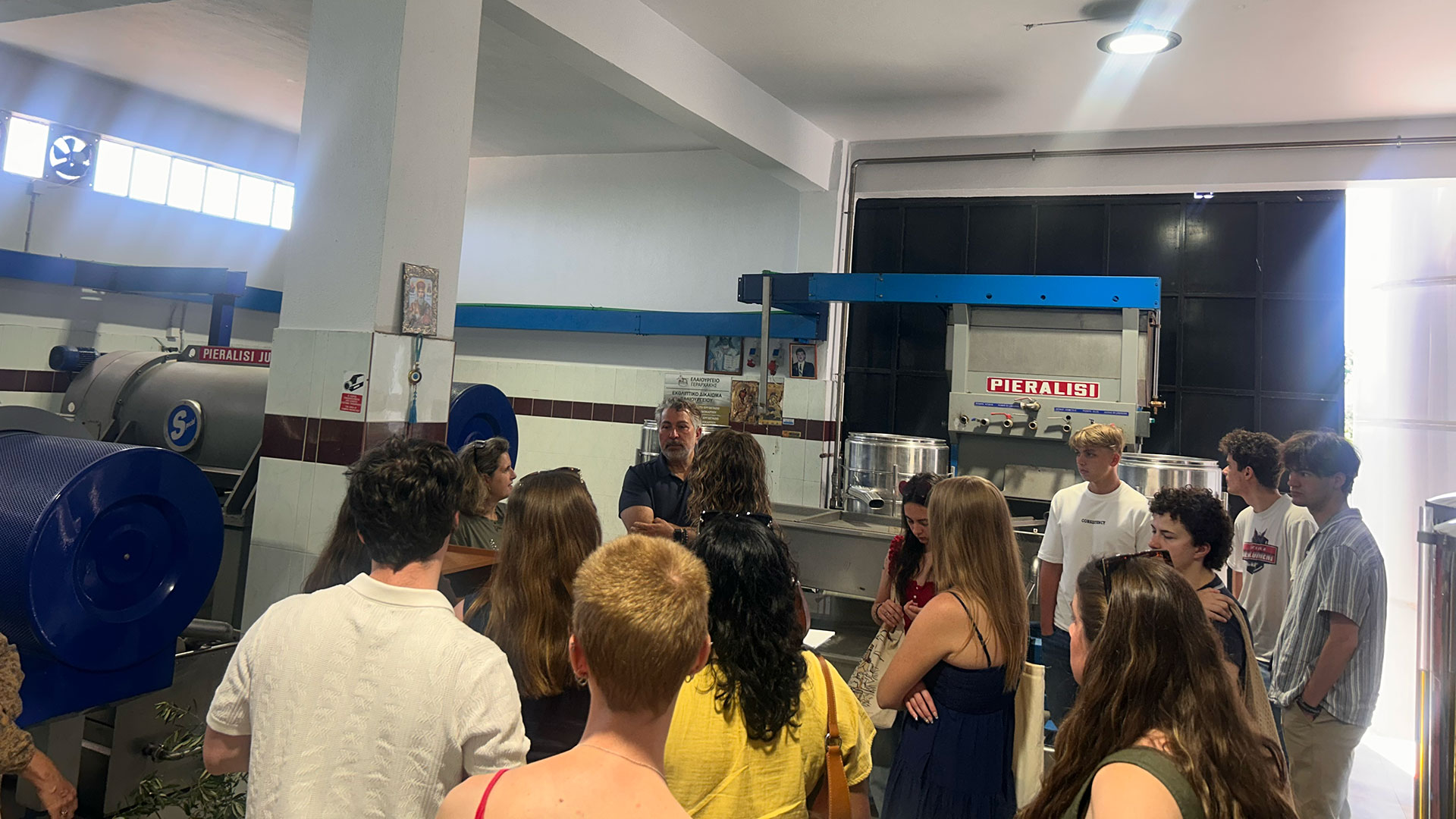 Students on a tour in an industrial building