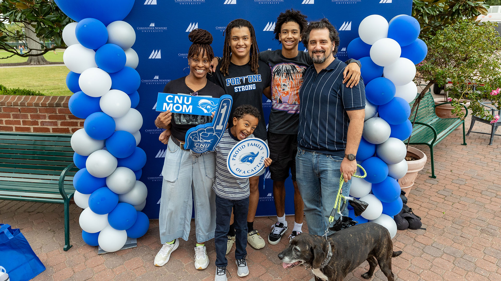 A family holds CNU props