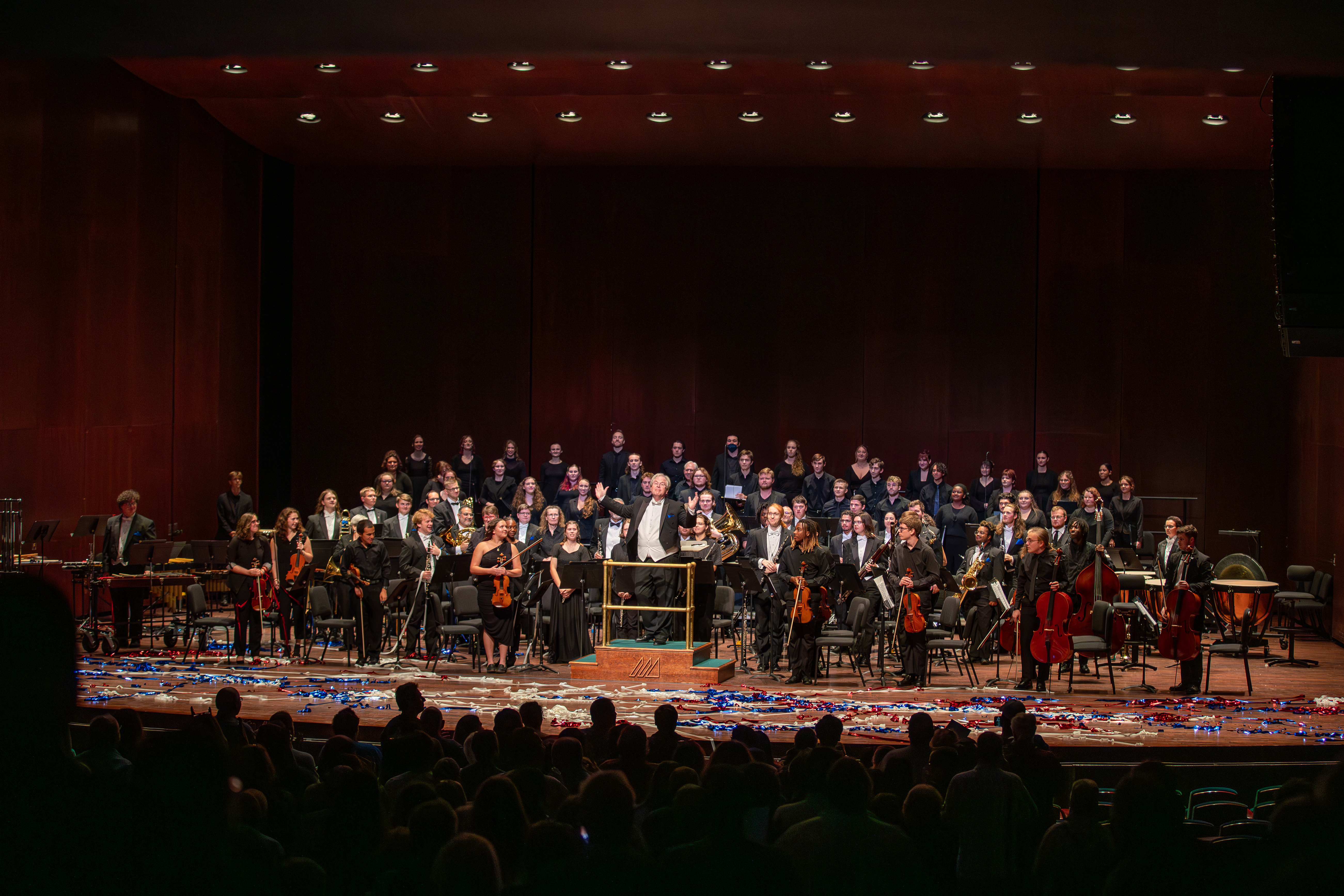 musical showcase performers on stage taking their final bow