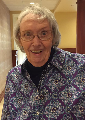A. Jane Chambers smiles for a portrait.