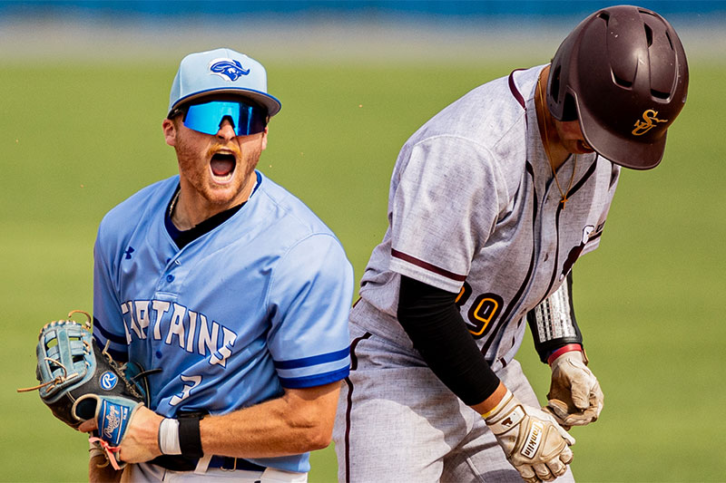 A CNU baseball player celebrates.