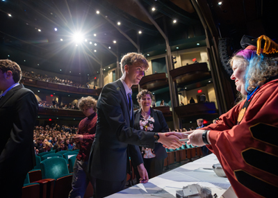 student signing the honor code