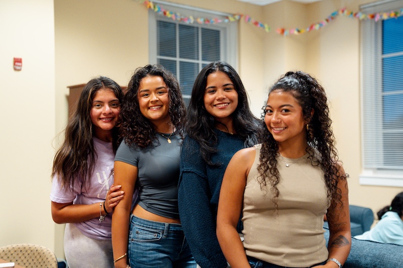 Four girls standing in a row