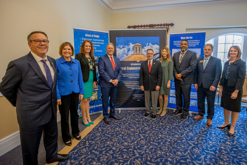 Members of the Board of Visitors and University leaders mark the launch of the School of Engineering and Computing