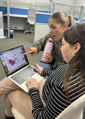 Students Samantha Spears (left) and Katherine Zickel (right) monitoring election results at WHRO studios.