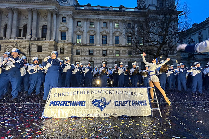 Members of the Marching Captains perform in Parliament Square in London