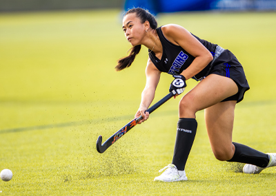 Lainey Pratzner playing field hockey for CNU
