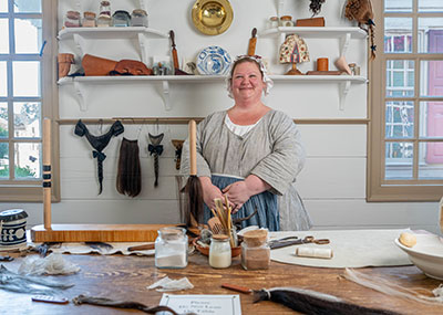Debbie Turpin amongst her tools at her shop in Colonial Williamsburg