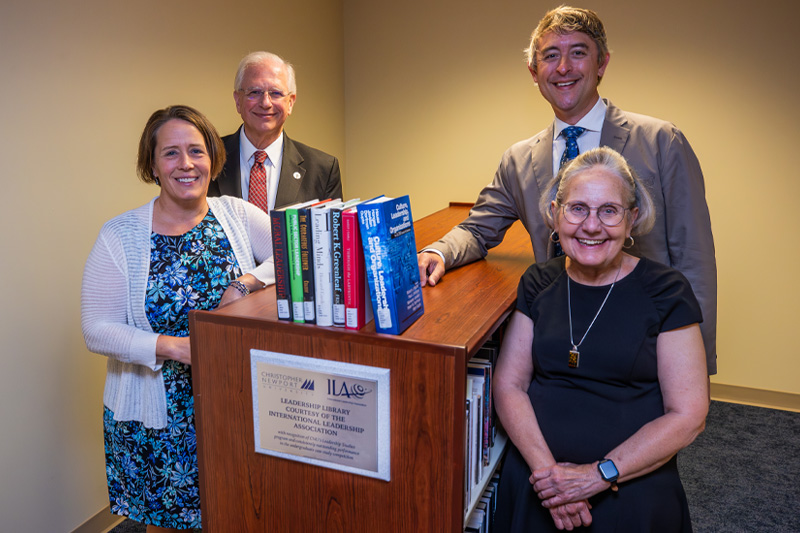 group of people with new mini library